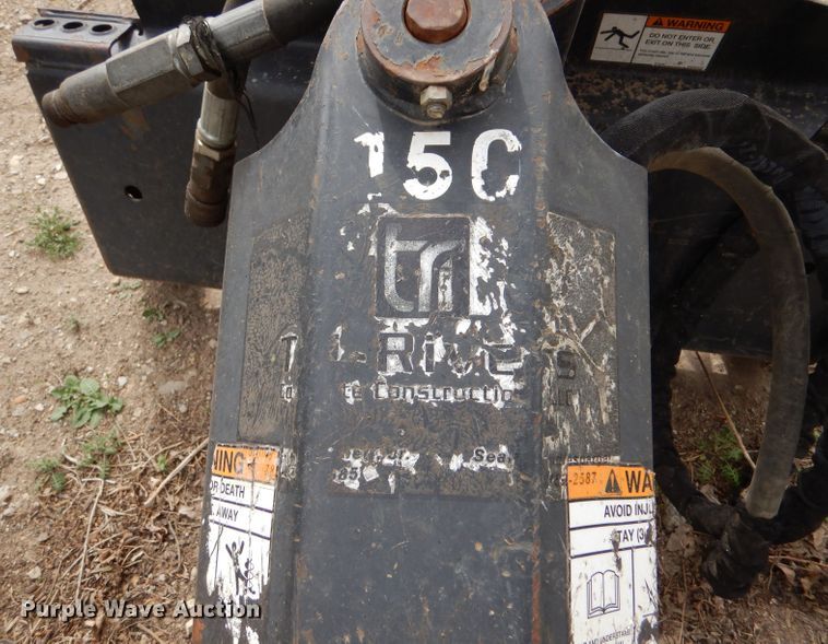 image for item LS9065 2010 Bobcat 15C skid steer auger