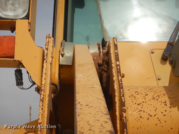 image for item DJ8949 1999 John Deere 744H  wheel loader