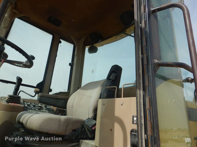 image for item DJ8949 1999 John Deere 744H  wheel loader