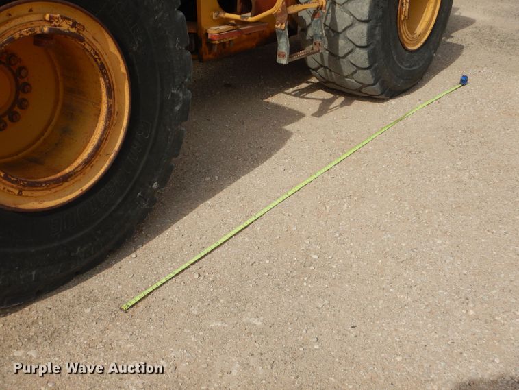 image for item DJ8949 1999 John Deere 744H  wheel loader