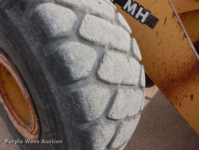 image for item DJ8949 1999 John Deere 744H  wheel loader