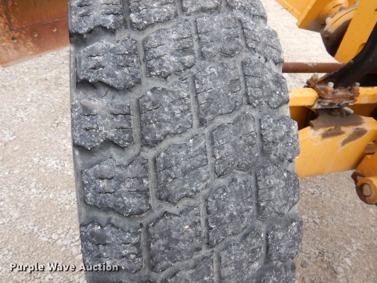 image for item DK1994 2001 John Deere 770CH  motor grader