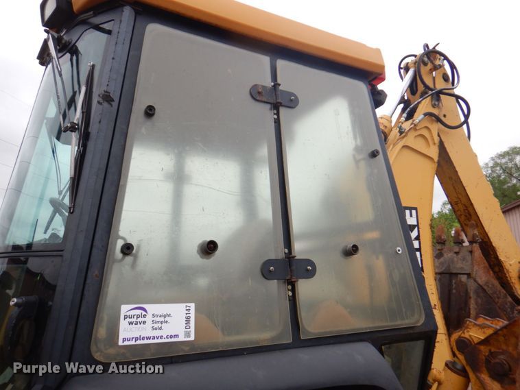 image for item DM6147 1998 John Deere 310E  backhoe