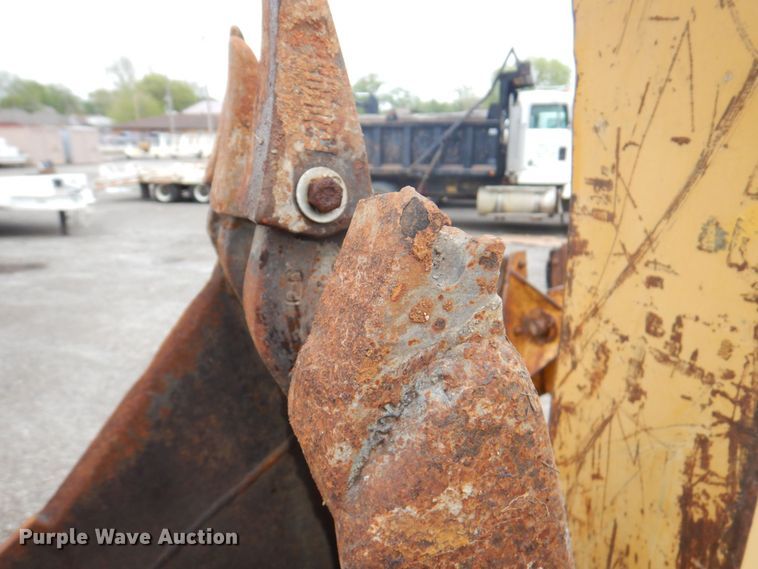 image for item DM6147 1998 John Deere 310E  backhoe