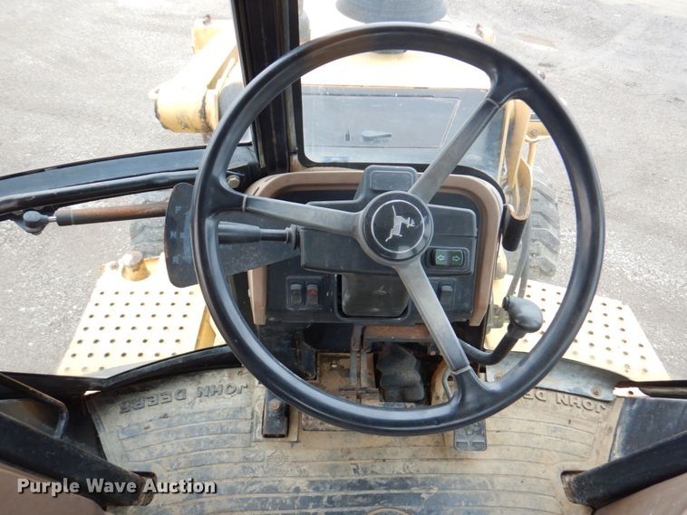 image for item DM6147 1998 John Deere 310E  backhoe