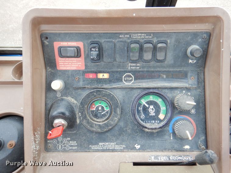 image for item DM6147 1998 John Deere 310E  backhoe