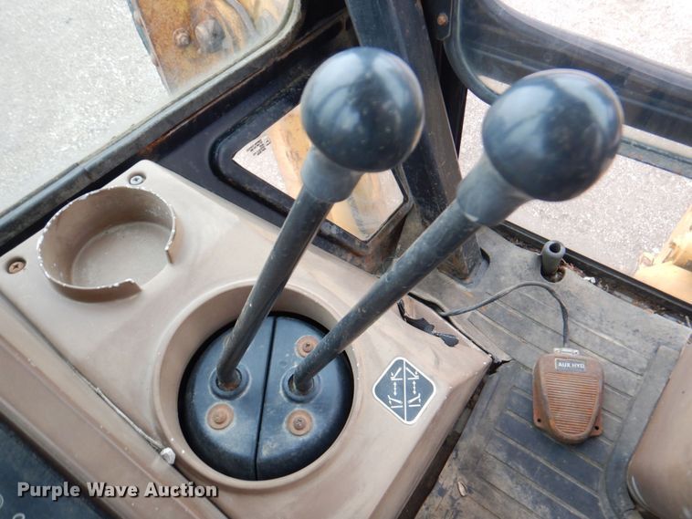 image for item DM6147 1998 John Deere 310E  backhoe