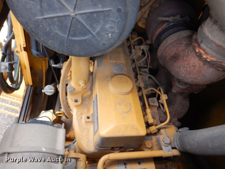 image for item DM6147 1998 John Deere 310E  backhoe