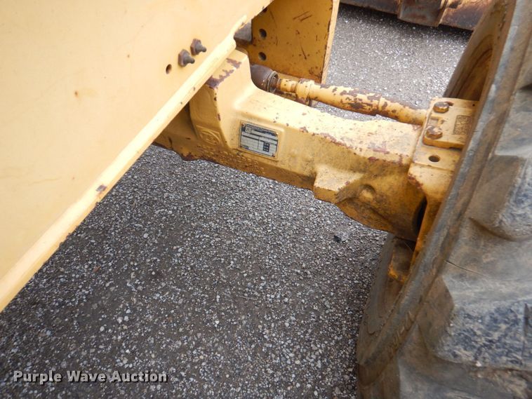 image for item DM6147 1998 John Deere 310E  backhoe