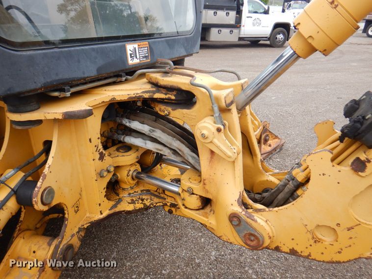 image for item DM6147 1998 John Deere 310E  backhoe