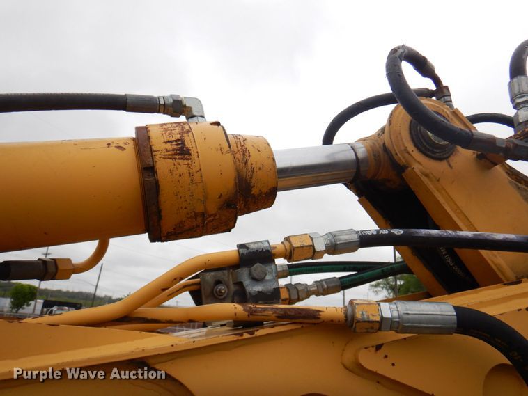 image for item DM6147 1998 John Deere 310E  backhoe