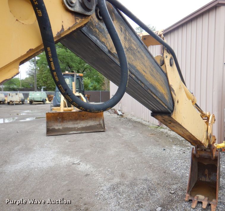 image for item DM6147 1998 John Deere 310E  backhoe