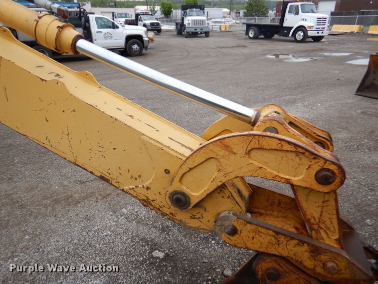 image for item DM6147 1998 John Deere 310E  backhoe