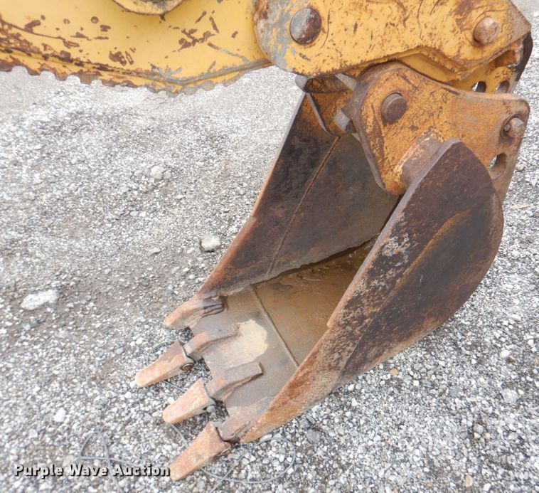 image for item DM6147 1998 John Deere 310E  backhoe