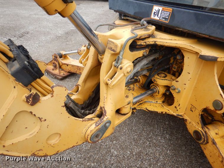 image for item DM6147 1998 John Deere 310E  backhoe