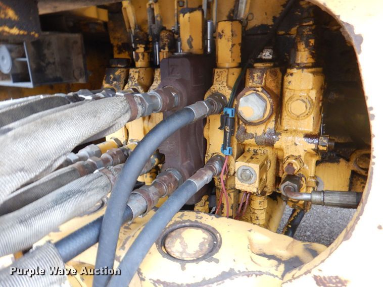 image for item DM6147 1998 John Deere 310E  backhoe