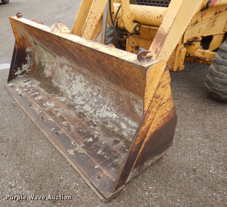 image for item DM6147 1998 John Deere 310E  backhoe