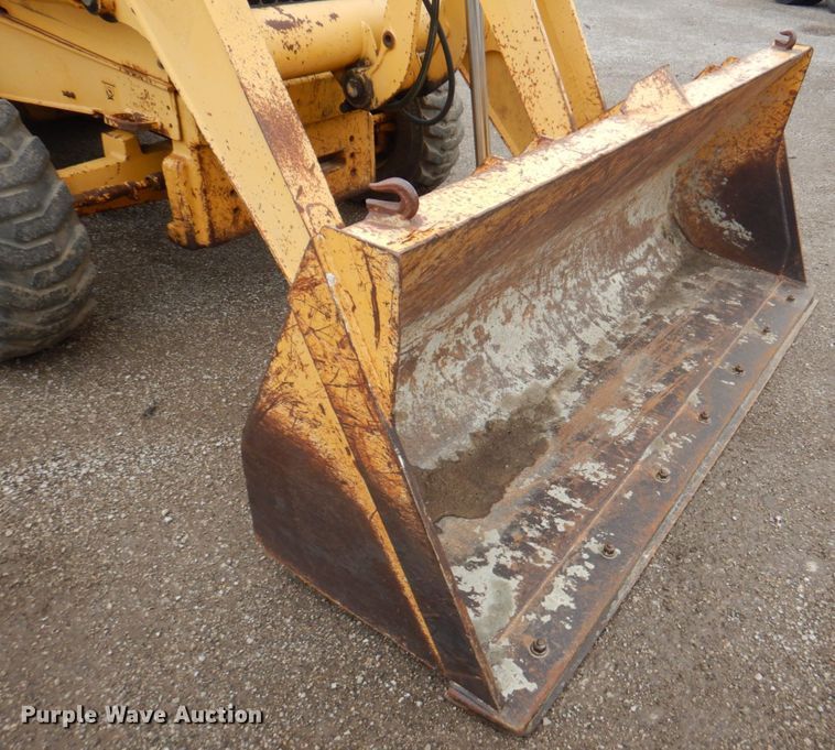image for item DM6147 1998 John Deere 310E  backhoe