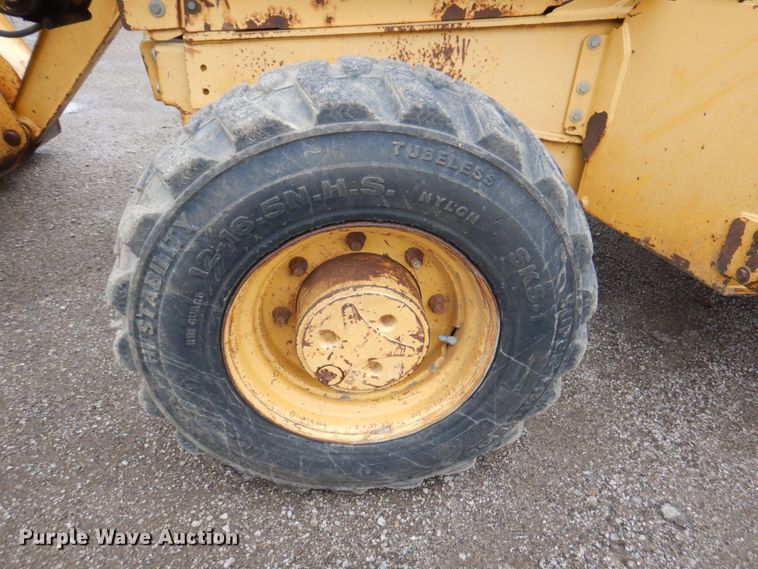 image for item DM6147 1998 John Deere 310E  backhoe