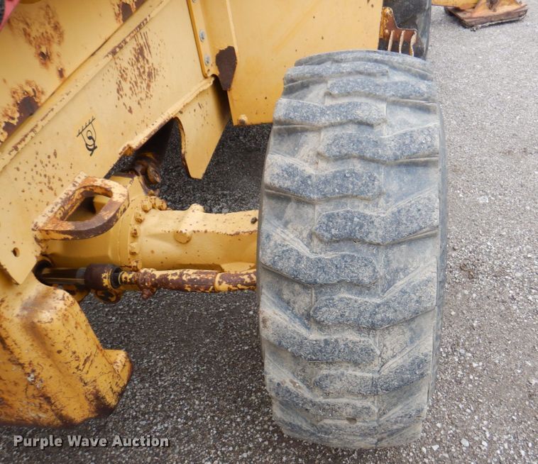 image for item DM6147 1998 John Deere 310E  backhoe