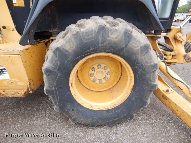 image for item DM6147 1998 John Deere 310E  backhoe