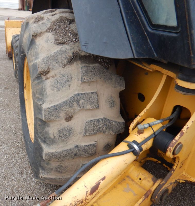 image for item DM6147 1998 John Deere 310E  backhoe