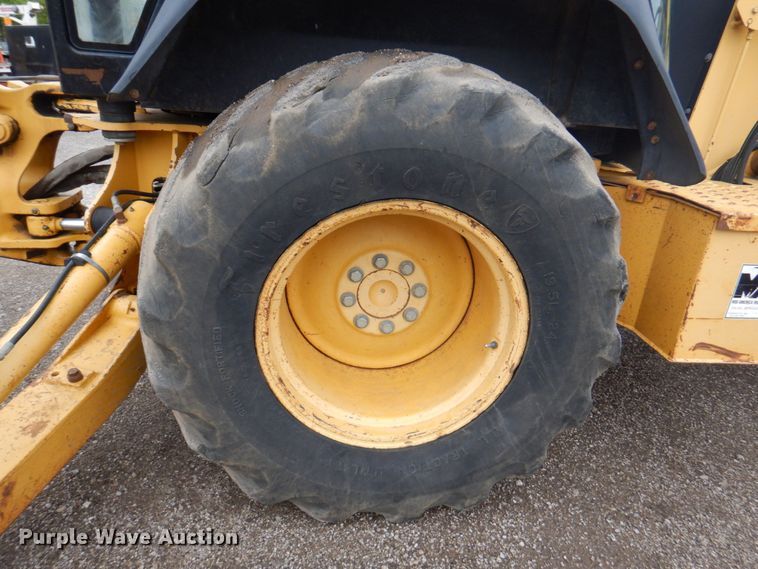 image for item DM6147 1998 John Deere 310E  backhoe