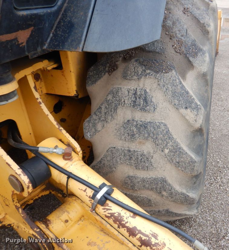 image for item DM6147 1998 John Deere 310E  backhoe