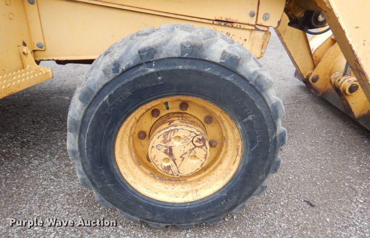 image for item DM6147 1998 John Deere 310E  backhoe