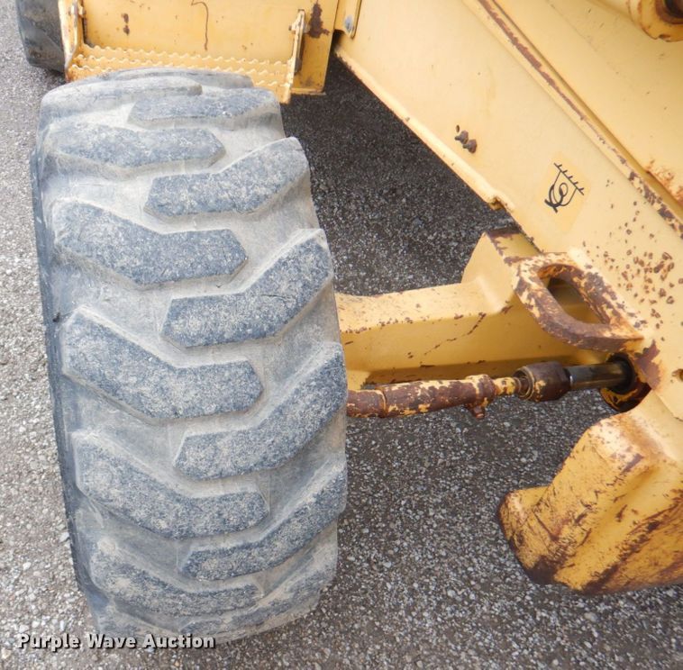 image for item DM6147 1998 John Deere 310E  backhoe