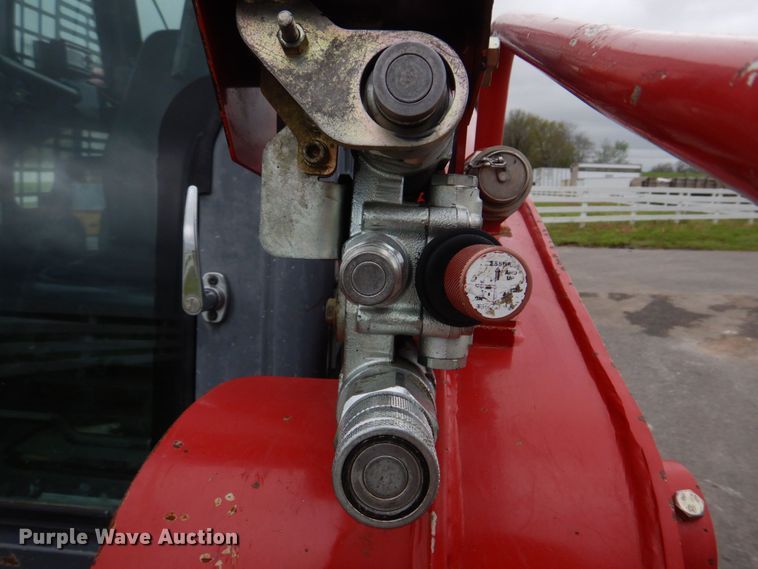 image for item DM7321 2013 Takeuchi TL12  skid steer loader