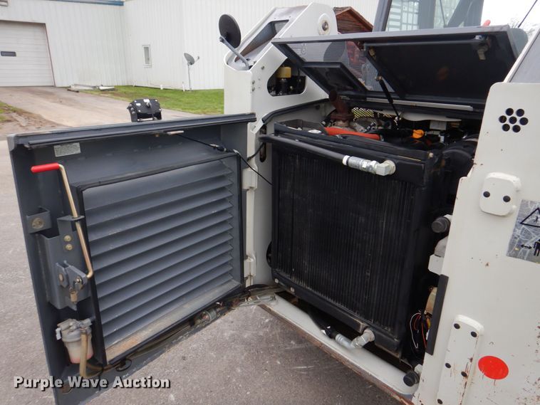 image for item DM7321 2013 Takeuchi TL12  skid steer loader