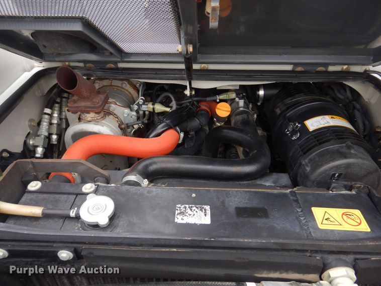 image for item DM7321 2013 Takeuchi TL12  skid steer loader