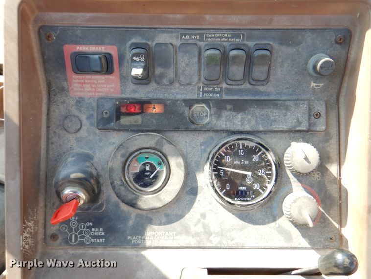 image for item DN1407 1999 John Deere 310E  backhoe