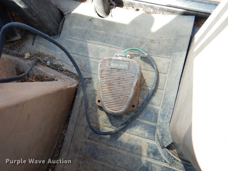 image for item DN1407 1999 John Deere 310E  backhoe