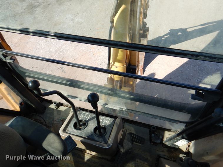 image for item DN1407 1999 John Deere 310E  backhoe