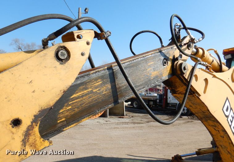 image for item DN1407 1999 John Deere 310E  backhoe