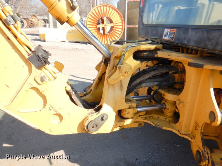 image for item DN1407 1999 John Deere 310E  backhoe