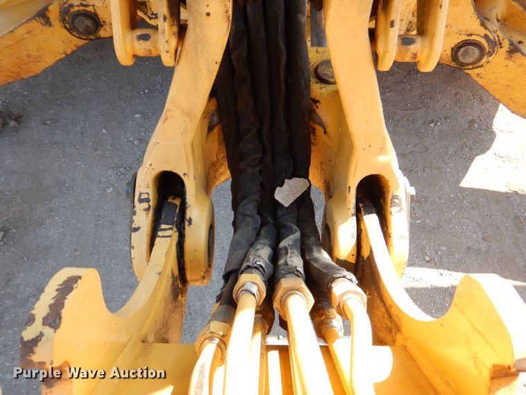 image for item DN1407 1999 John Deere 310E  backhoe