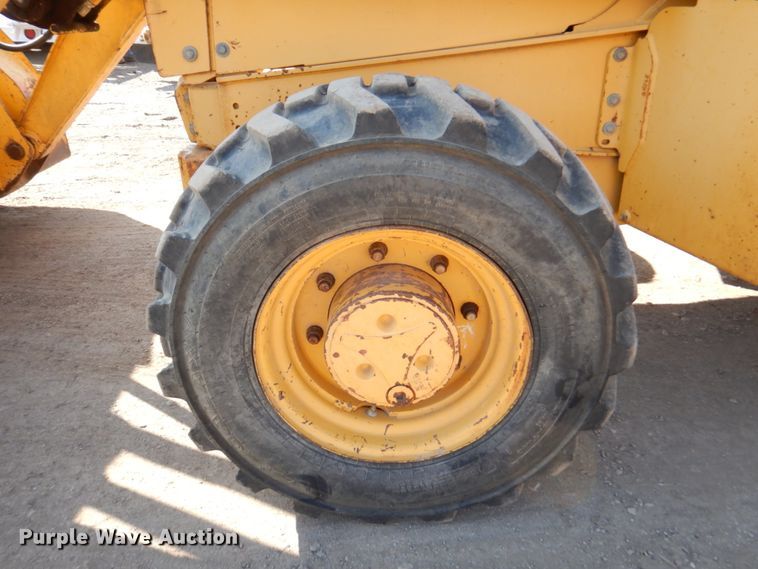 image for item DN1407 1999 John Deere 310E  backhoe