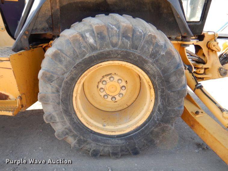 image for item DN1407 1999 John Deere 310E  backhoe