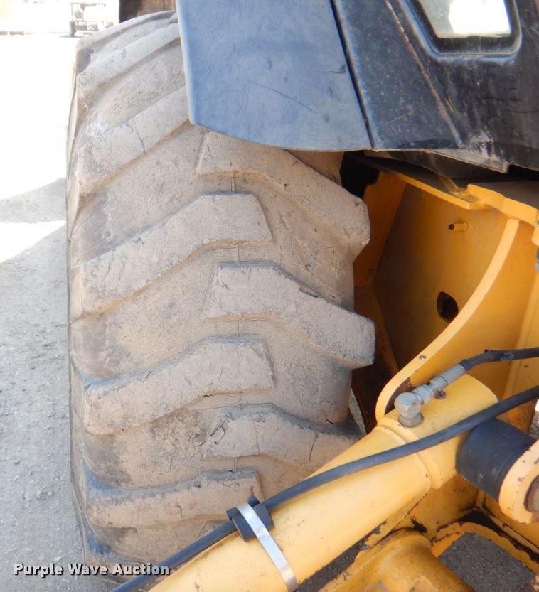 image for item DN1407 1999 John Deere 310E  backhoe