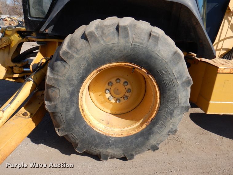 image for item DN1407 1999 John Deere 310E  backhoe