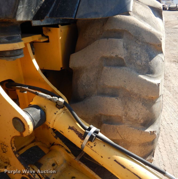 image for item DN1407 1999 John Deere 310E  backhoe