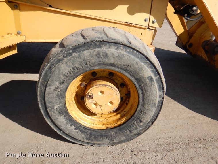 image for item DN1407 1999 John Deere 310E  backhoe