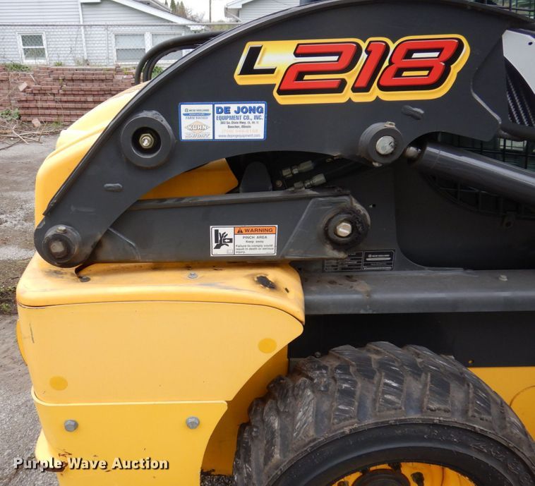 image for item IM9965 2011 New Holland L218  skid steer loader