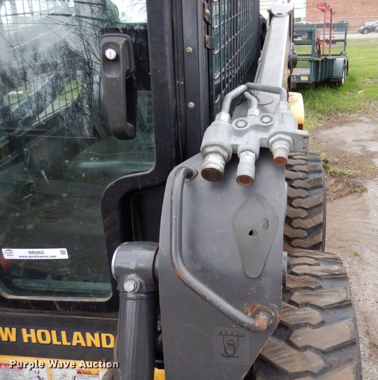 image for item IM9965 2011 New Holland L218  skid steer loader