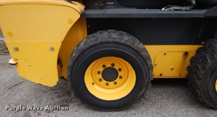 image for item IM9965 2011 New Holland L218  skid steer loader