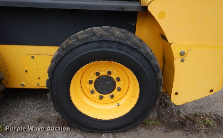 image for item IM9965 2011 New Holland L218  skid steer loader