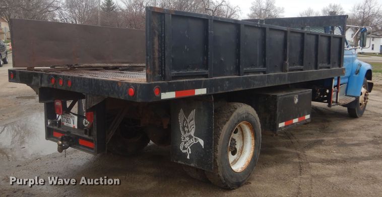 image for item KT9009 1996 Ford F700  dump flatbed truck